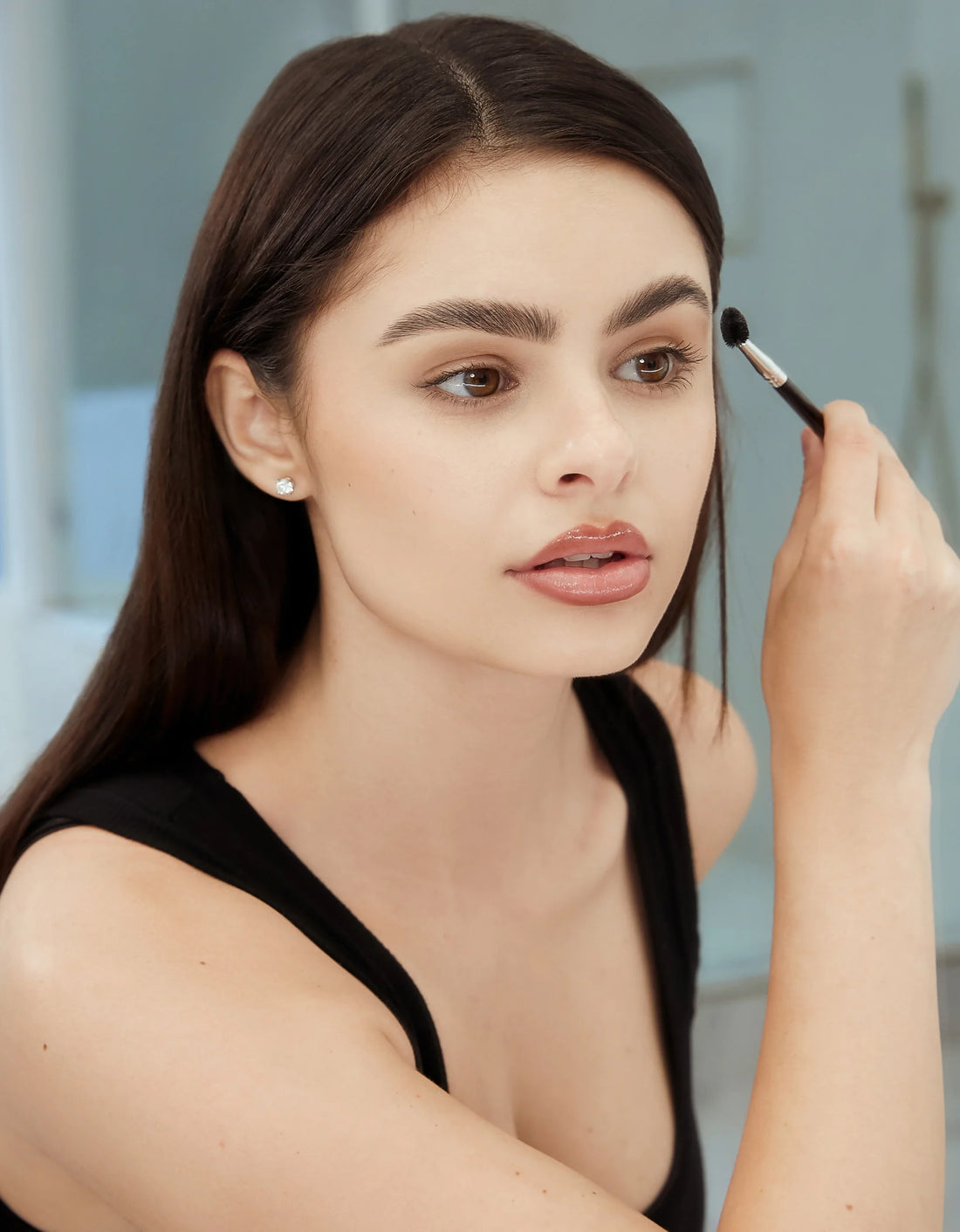 Sleek, polished brows, laminated using Brow Snob's Pro Lamination Kit.